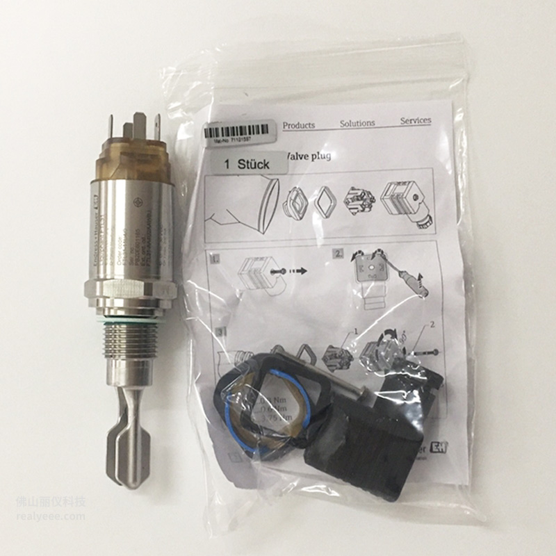 E+H FTL31 tuning fork level switch real product photo with business card